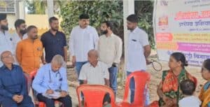 Free health check-up camp organized by local health authorities focusing on community well-being and preventive medicine in rural areas.